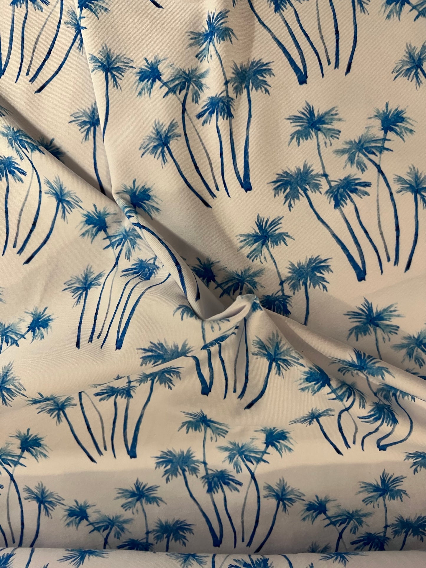 Jersey: navy silver foil llamas and cacti, aqua striped flamingos, blue palm trees, pandas, flamingos and pineapples